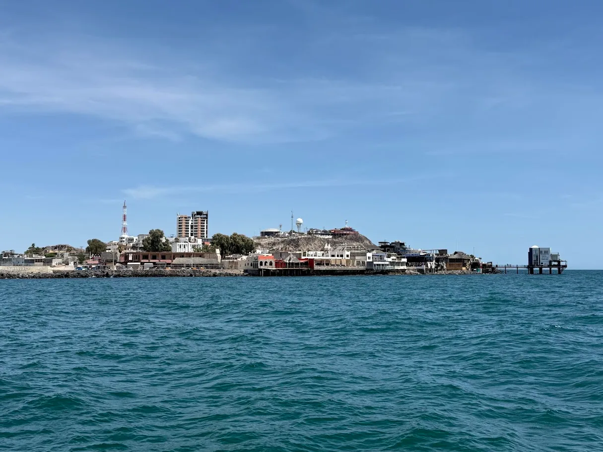 The Puerto Peñasco waterfront and hill seen from the water
